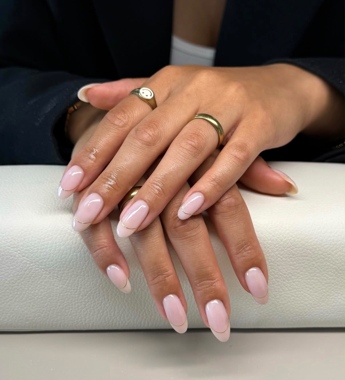 Elegant almond-shaped nails with a subtle French